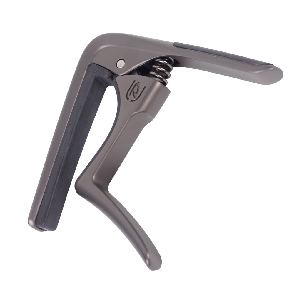 Dunlop 63CGM Capo para Guitarra Acústica Trigger Fly Curvo Pavonado